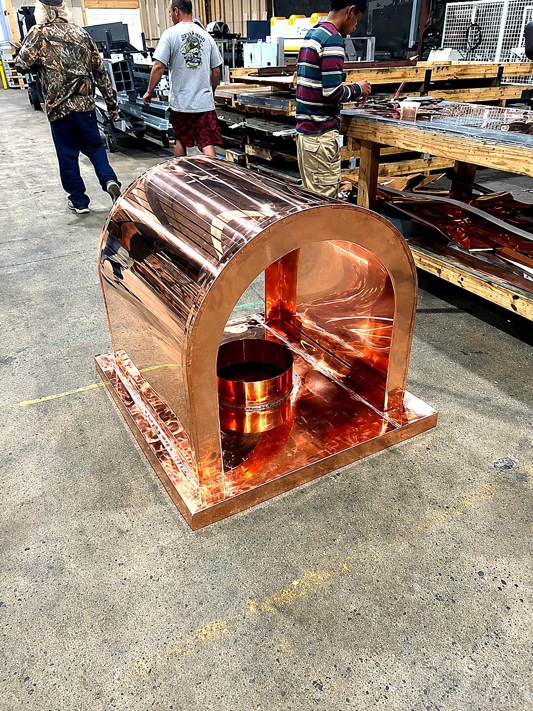 Custom copper sheet metal arch fabricated in shop